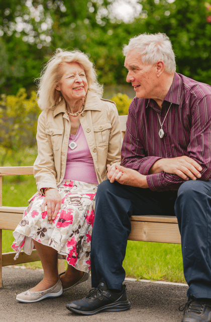 Couple sitting on chair - smaller size