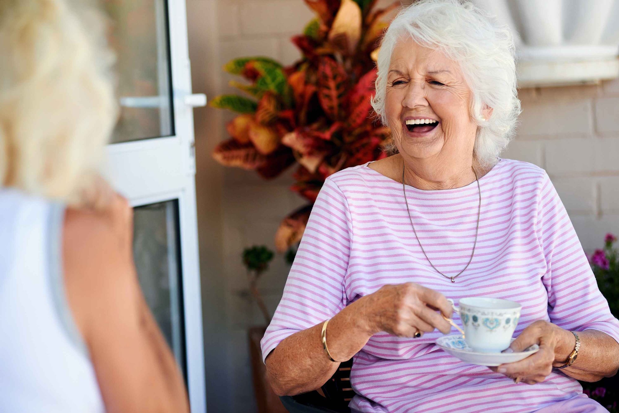 Woman drinking tea outside