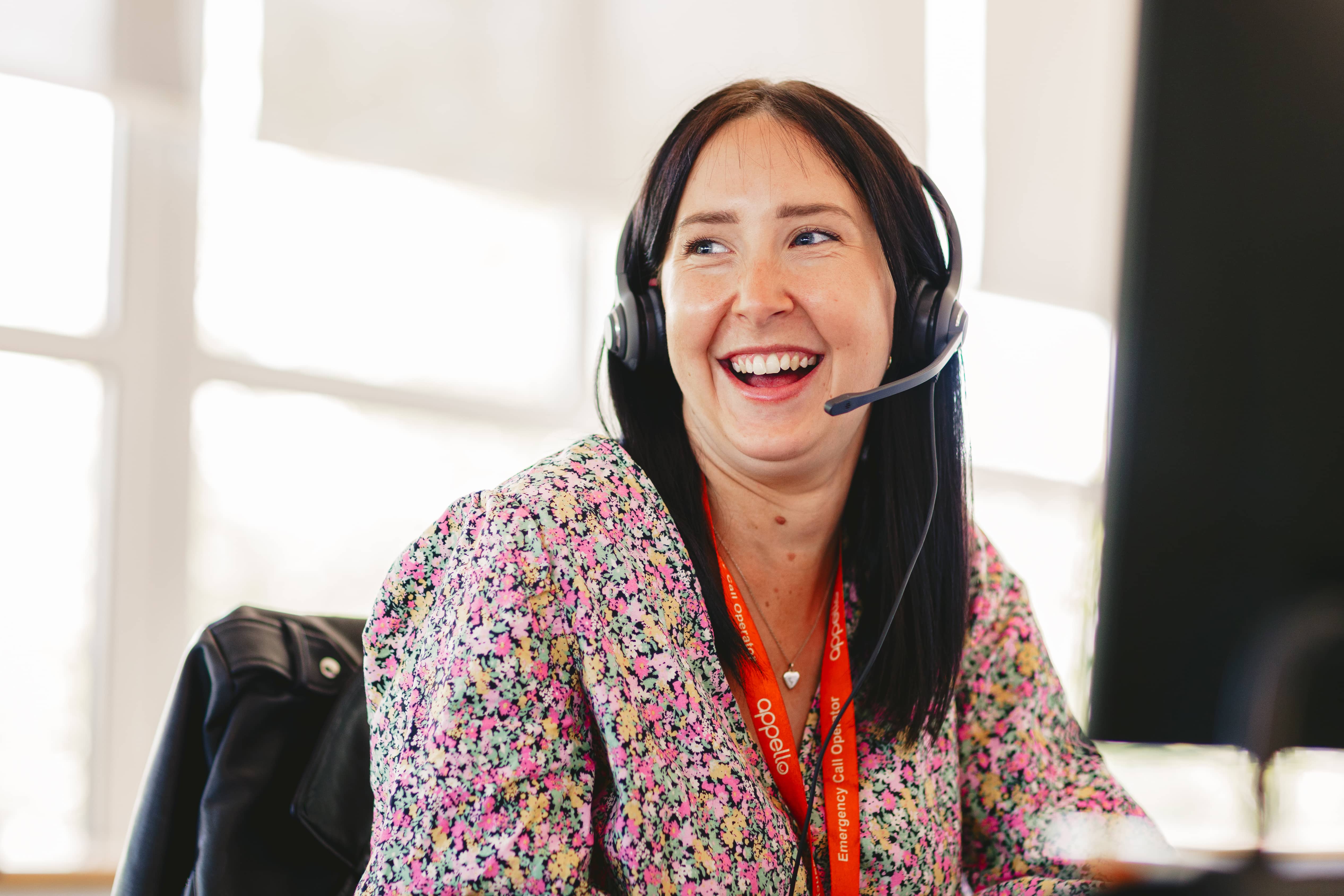 Appello colleague laughing on a call