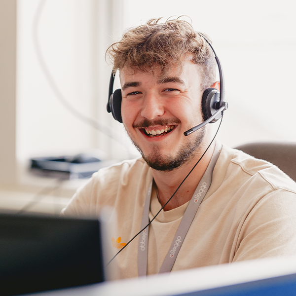 Male Operator smiling - smaller size